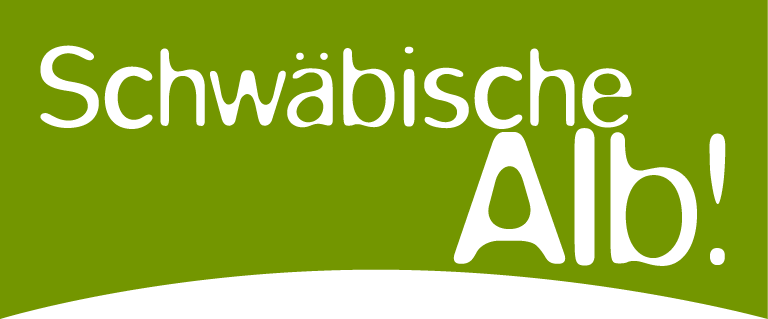 Logo Schwäbische Alb. Schritzug auf einer grünen Fläche